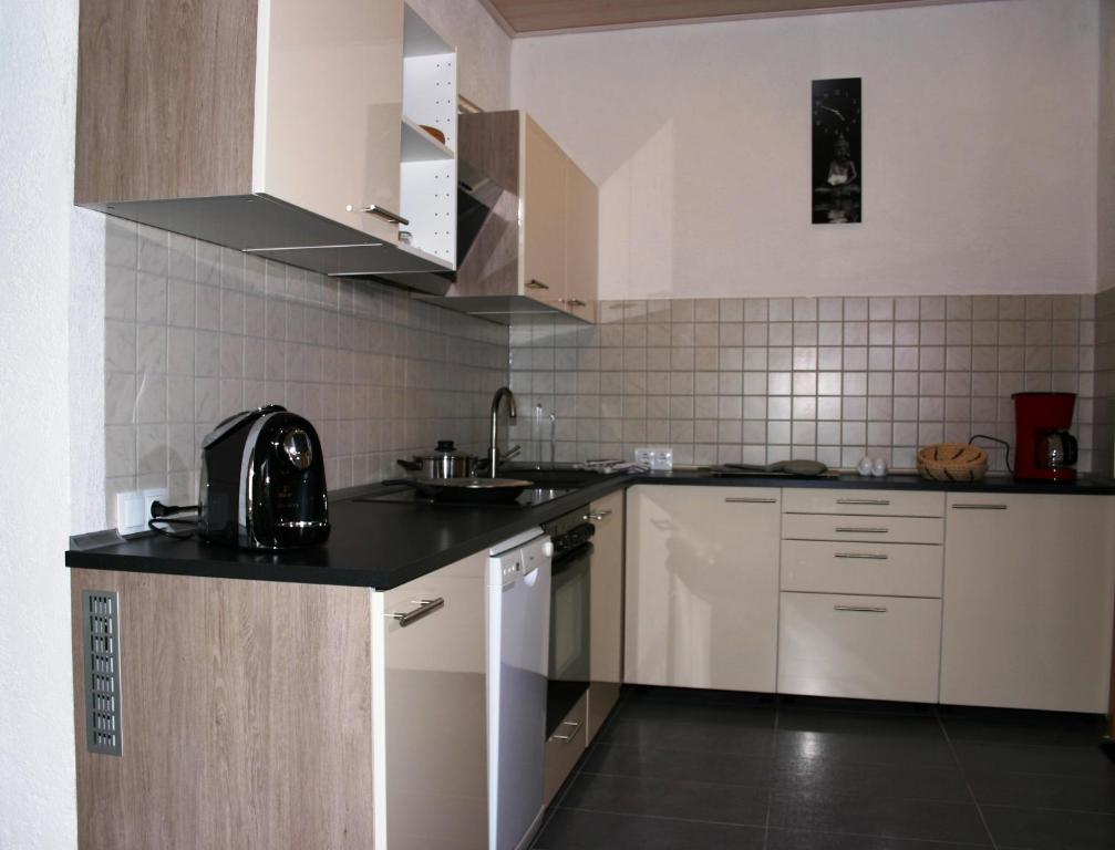 Kuchyň nebo kuchyňský kout v ubytování Apartment Kraemer Dax