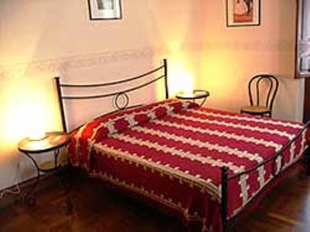 A bed or beds in a room at B&B Santa Chiara