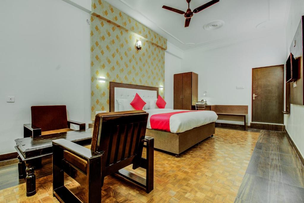 Ένα ή περισσότερα κρεβάτια σε δωμάτιο στο Hotel O Dream Palace