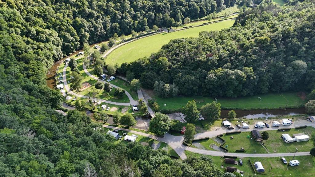 an aerial view of a parking lot with cars in a park at Camping Kautenbach in Kautenbach