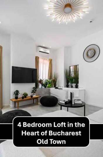 a living room with a light in the heart ofesteadestead old town at Boheme Social Apartment in Bucharest