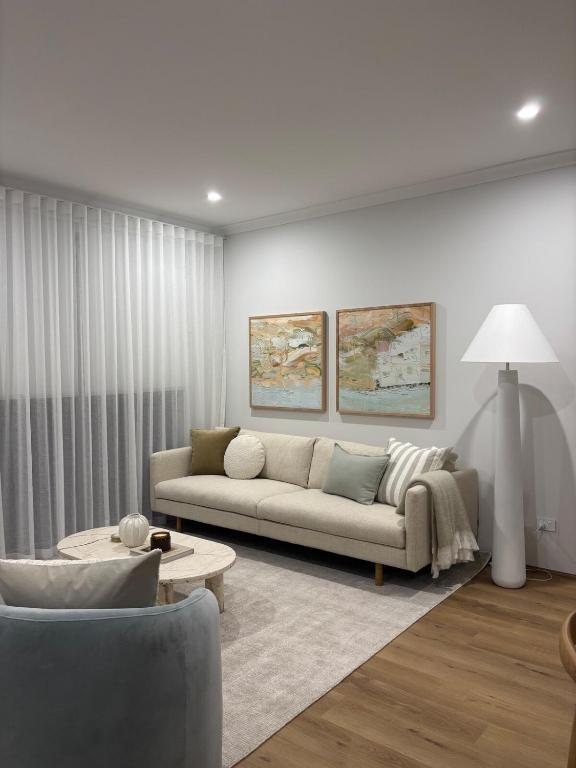 Χώρος καθιστικού στο Innisfree a luxury coastal home