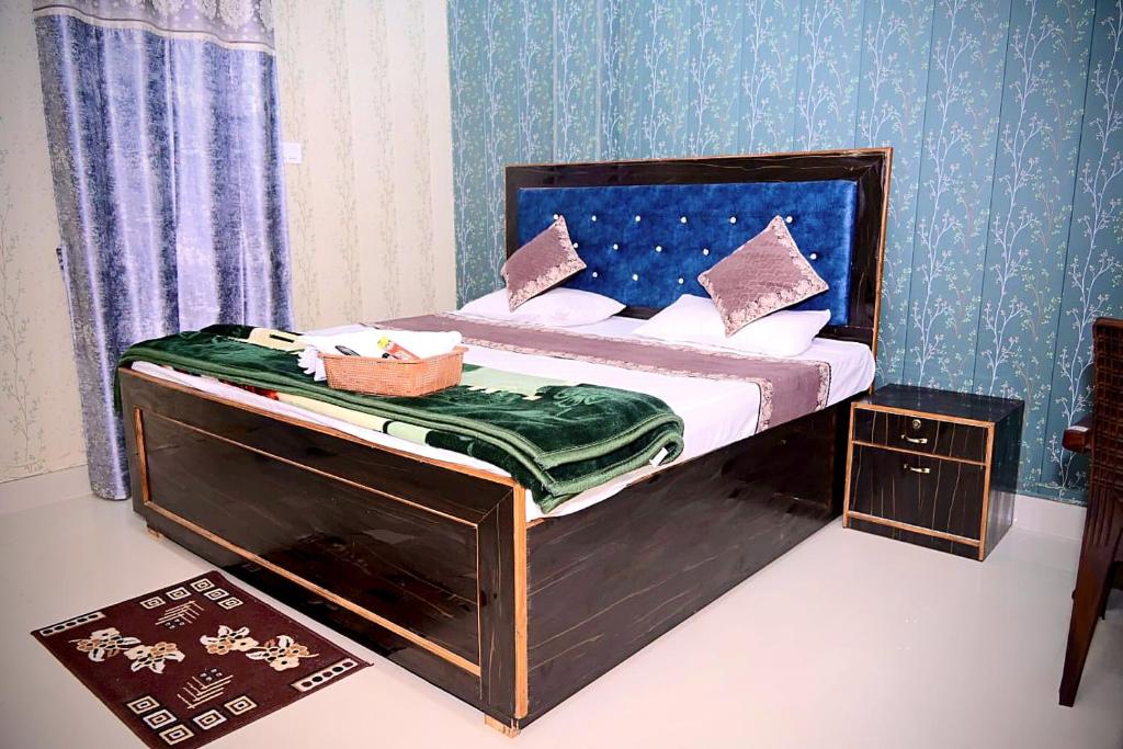 Postel nebo postele na pokoji v ubytování Akshayavat Palace