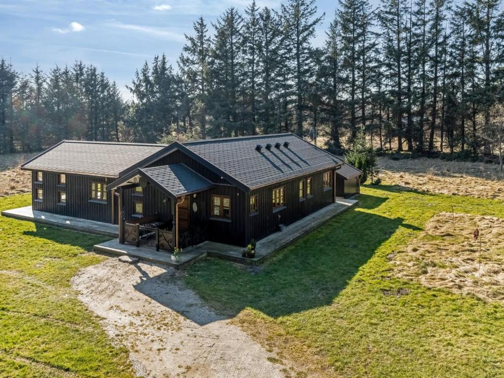 an overhead view of a house on a grass field at Holiday Home Marla - 1-1km from the sea by Interhome in Bindslev