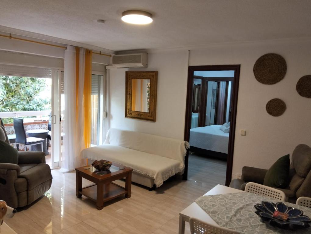 Un lugar para sentarse en Tropico Apartament