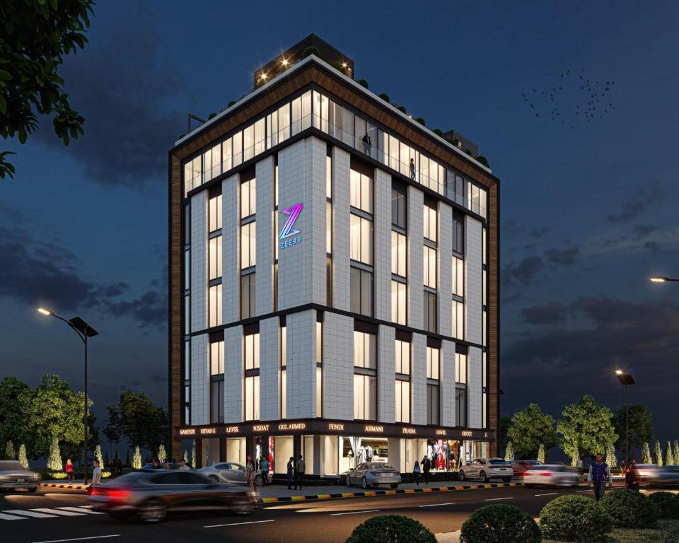 a tall building with cars in front of it at Zee99Arcade in Lahore