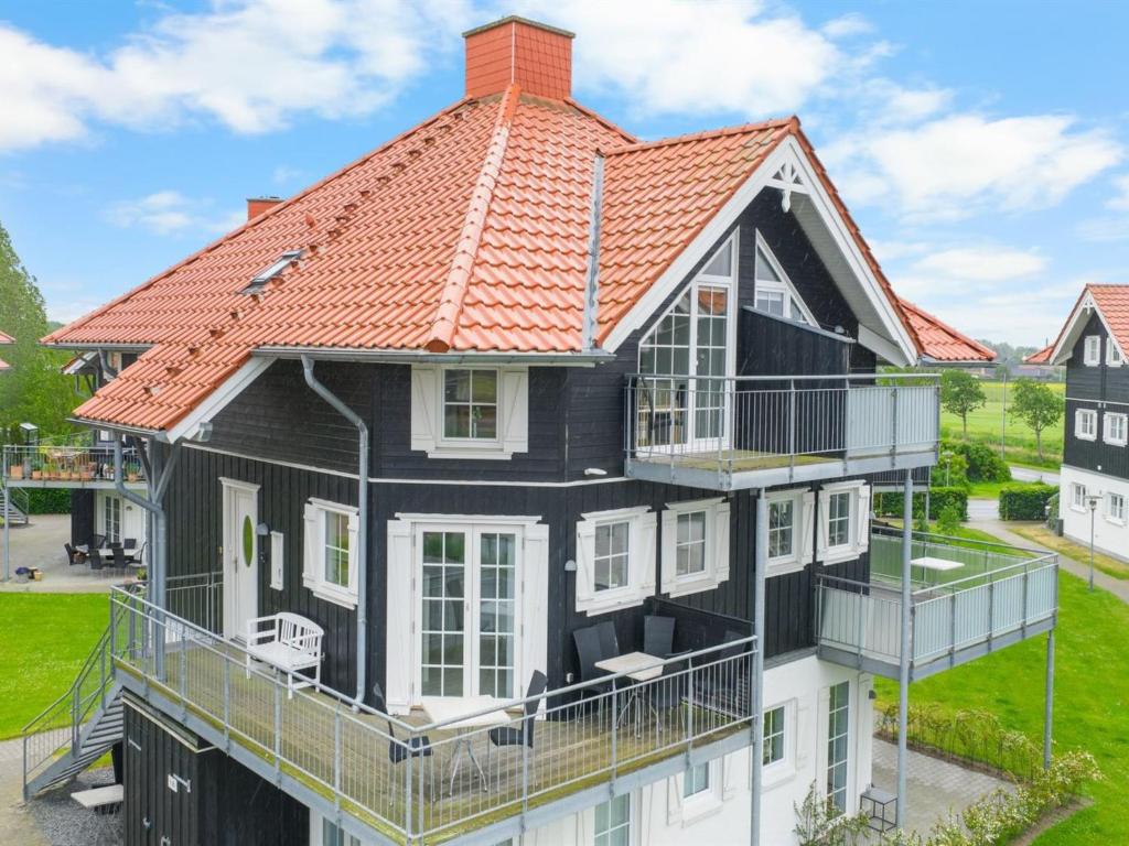 an image of a house with an orange roof at Apartment Ismo - 350m from the sea by Interhome in Bogense