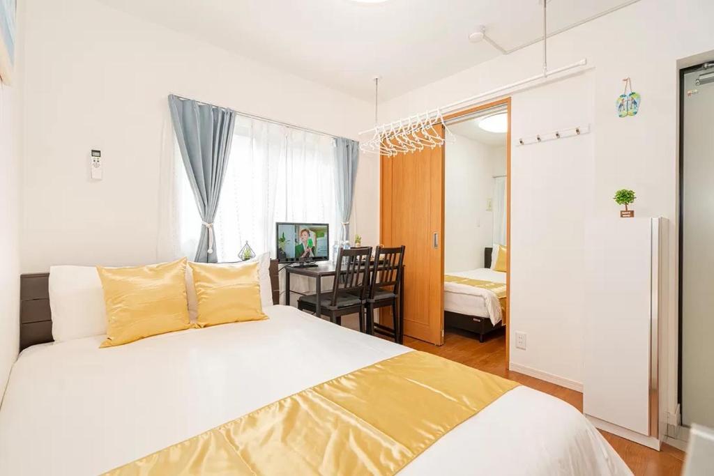 Cama ou camas em um quarto em KYARA Hotel 亀戸402