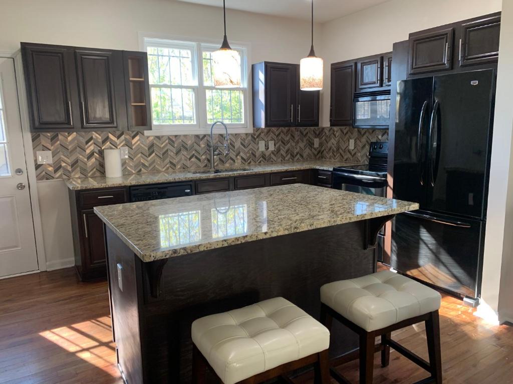 Kuchyň nebo kuchyňský kout v ubytování Downtown Anchor