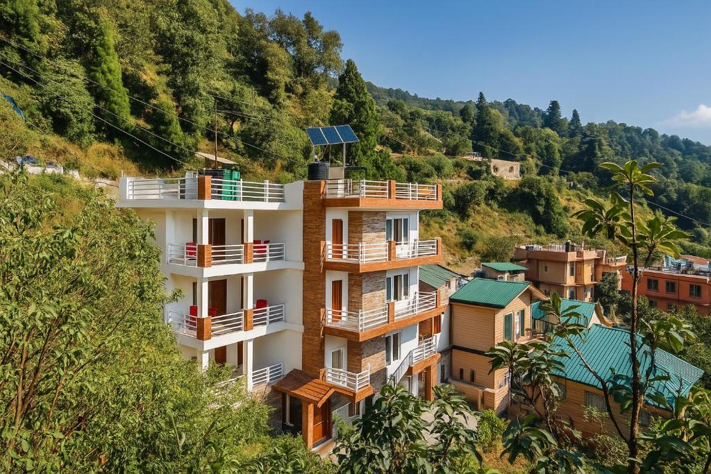 a building on the side of a hill at Vista Hills by Bala's in Mussoorie