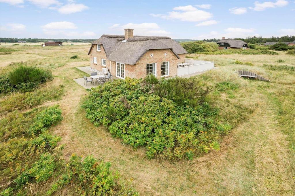 an aerial view of a house in a field at 10732-Ulfborg-Svollingvej-94 in Ulfborg