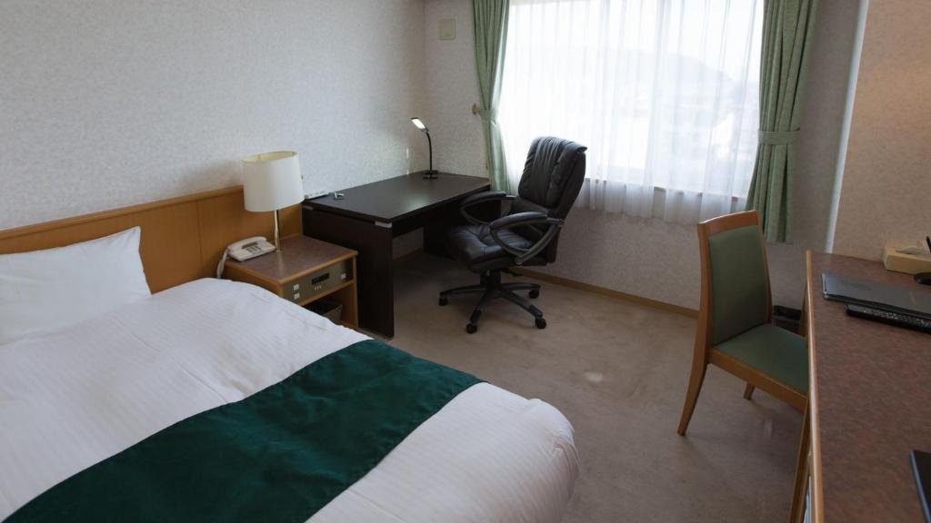 Postel nebo postele na pokoji v ubytování Hotel Laurel - Vacation STAY 14437v