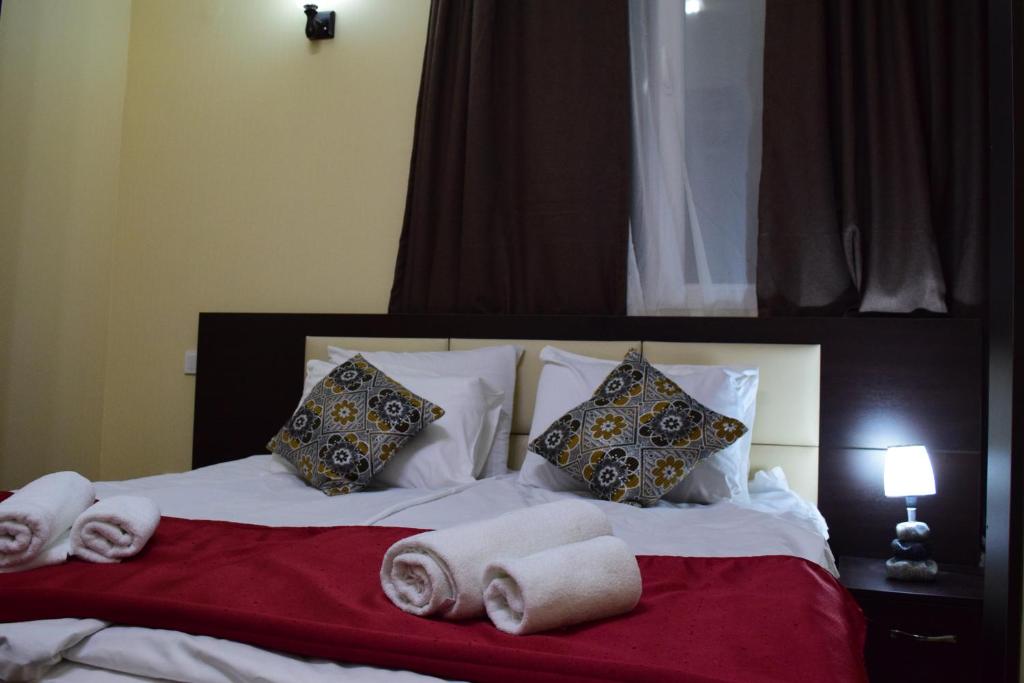Postel nebo postele na pokoji v ubytování Hotel White Neptun Georgia Tbilisi