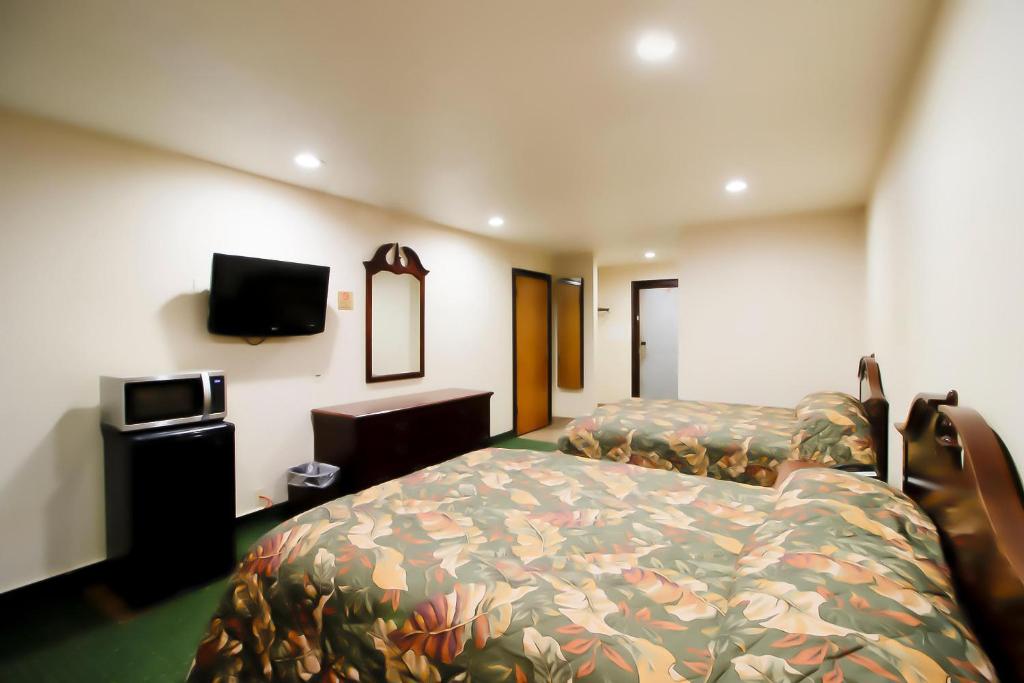 OYO Pinewood Inn & Suites Silsbee - Queen Kamer Met 2 Queensize Bedden
