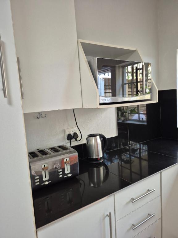 Η κουζίνα ή μικρή κουζίνα στο Jenkins Re-Treat