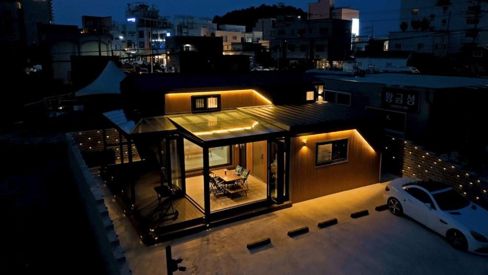 a view of a house with a car on a roof at Byeolbitdam Yangyang in Yangyang