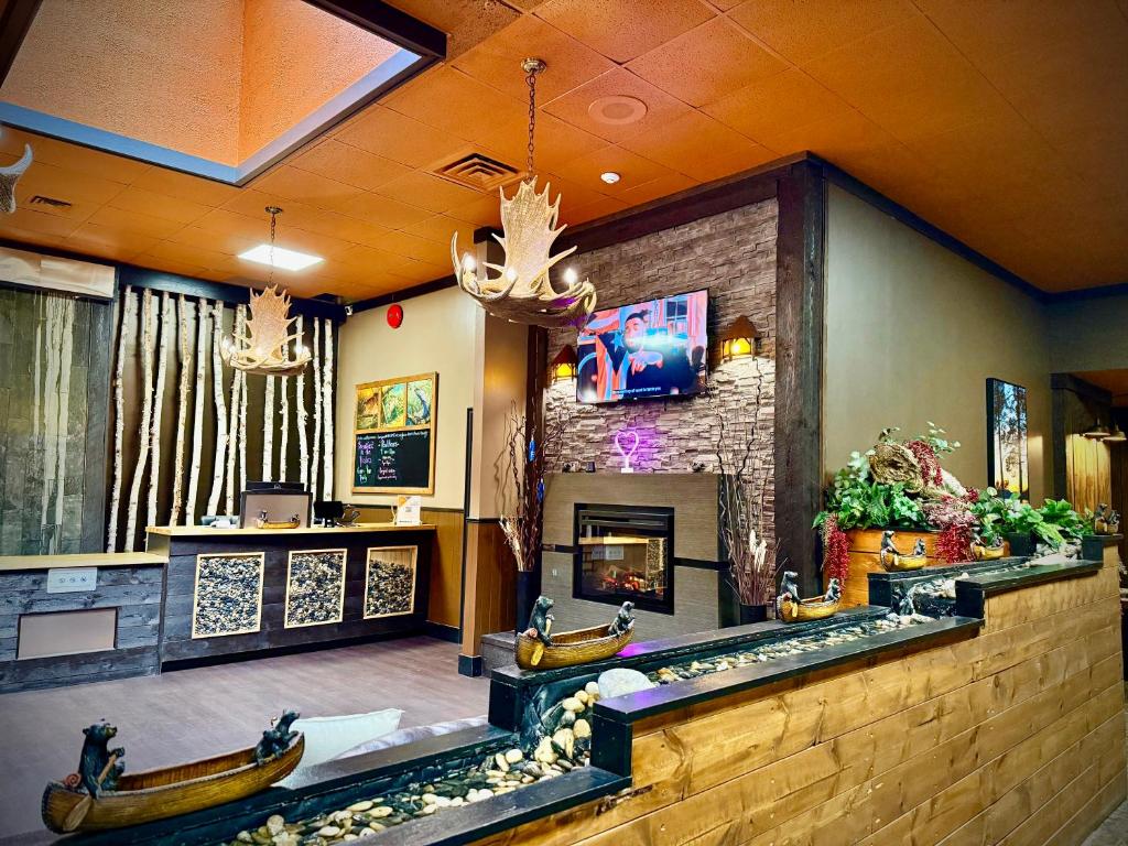 Телевизор и/или развлекательный центр в Quality Inn Fort Frances