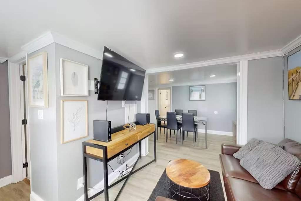 a living room with a couch and a dining room at Parrot Bay 35 in Ocean City