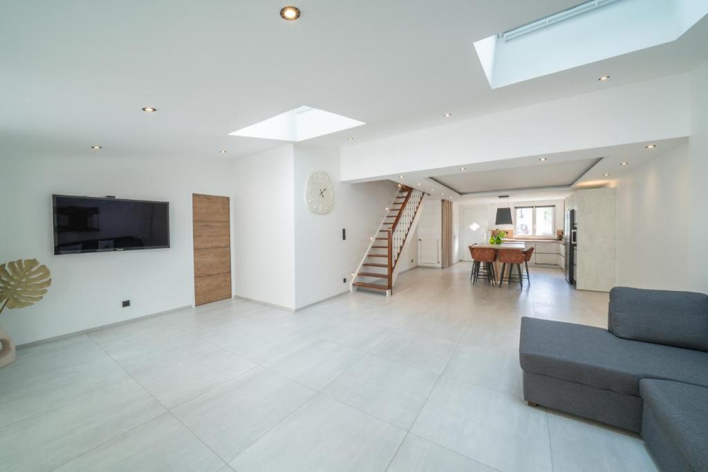 TV a/nebo společenská místnost v ubytování Villa moderne et spacieuse Disneyland Paris