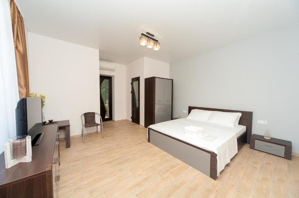 Postel nebo postele na pokoji v ubytování Hotel Fusion