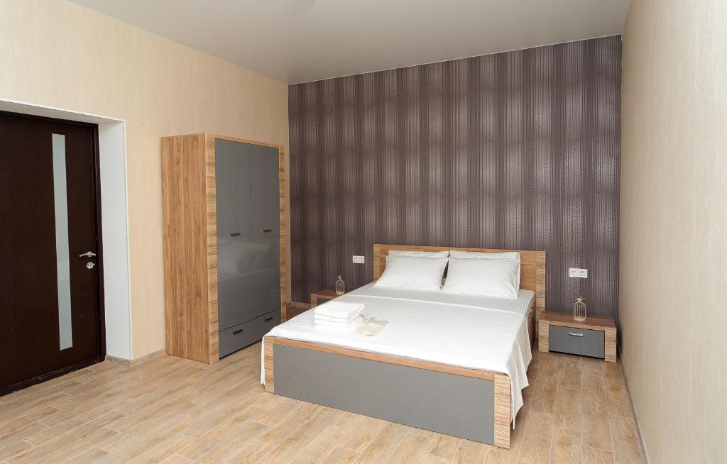 Postel nebo postele na pokoji v ubytování Hotel Fusion