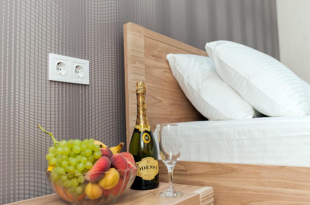 Postel nebo postele na pokoji v ubytování Hotel Fusion