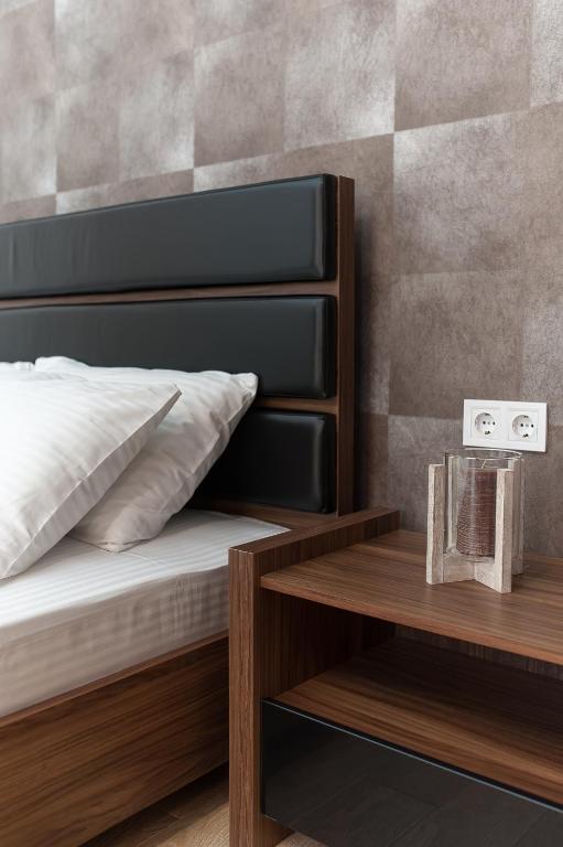 Postel nebo postele na pokoji v ubytování Hotel Fusion