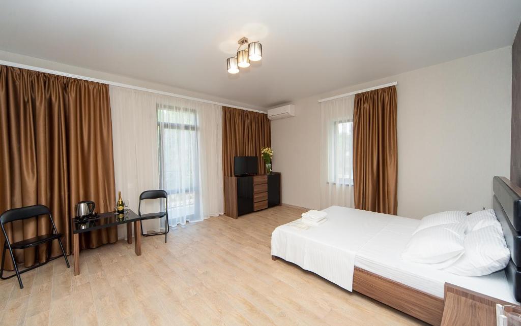 Postel nebo postele na pokoji v ubytování Hotel Fusion