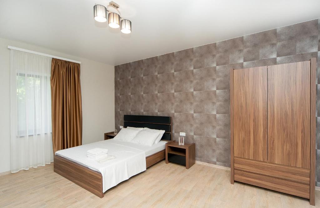 Postel nebo postele na pokoji v ubytování Hotel Fusion