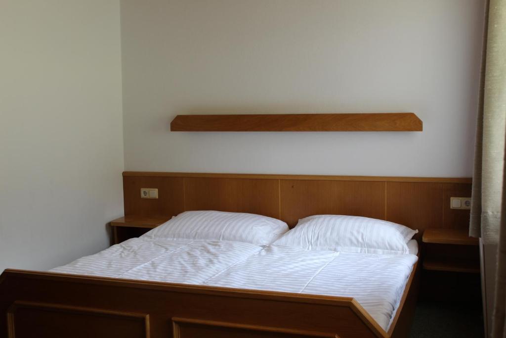 Postel nebo postele na pokoji v ubytování Landhaus Stocker