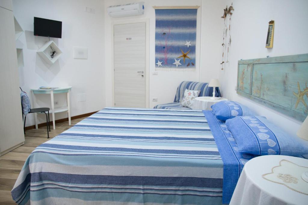 Postel nebo postele na pokoji v ubytování B&B Castello