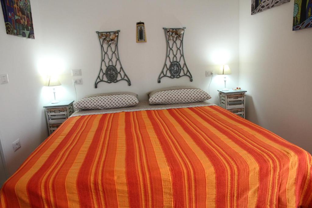 Postel nebo postele na pokoji v ubytování B&B Castello