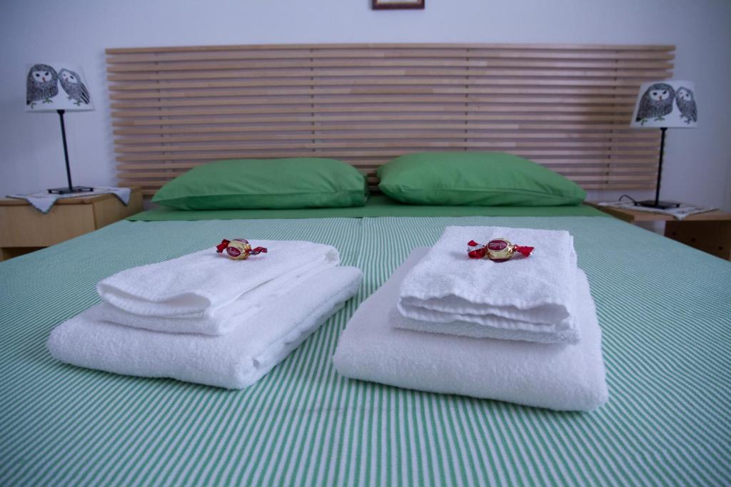 Postel nebo postele na pokoji v ubytování B&B Castello