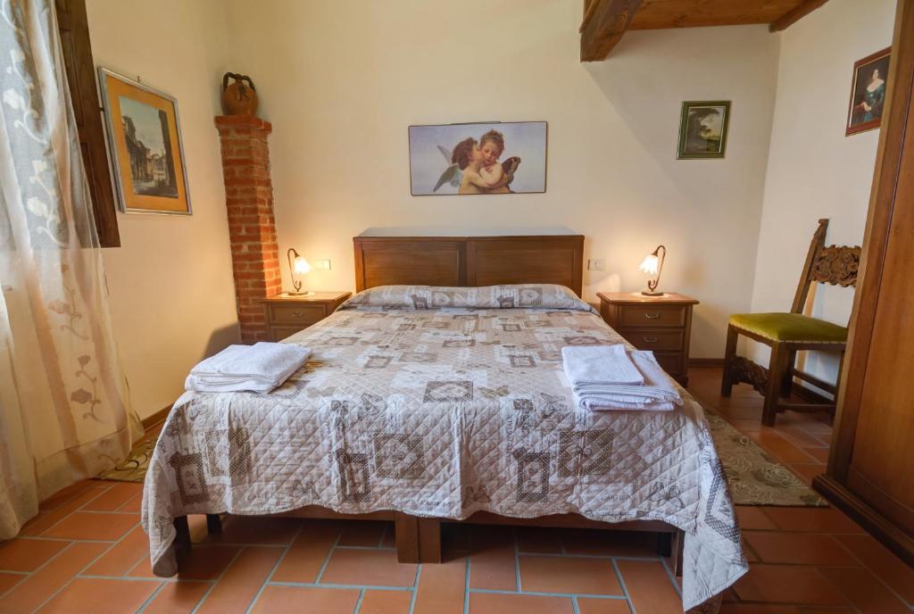 A bed or beds in a room at Agriturismo San Francesco