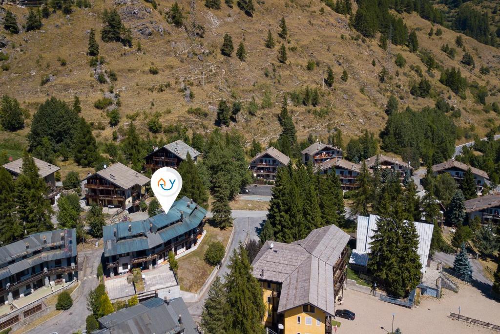 an aerial view of a resort with a train at Appartamento Nido Alpino - Happy Rentals in Souchères Basses