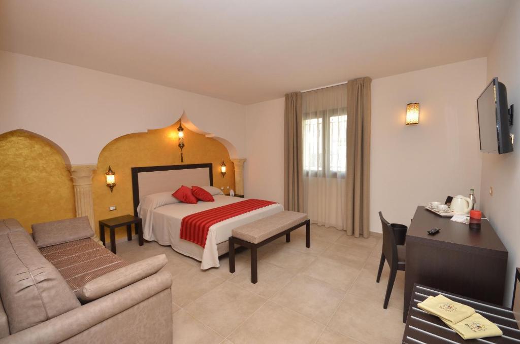 Postel nebo postele na pokoji v ubytování RIAD Comfort Rooms