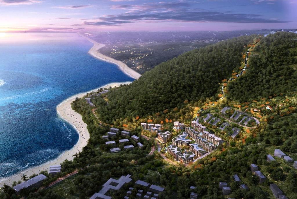 an aerial view of a resort next to the ocean at Wyndham Garden Phuket Kamala in Kamala Beach