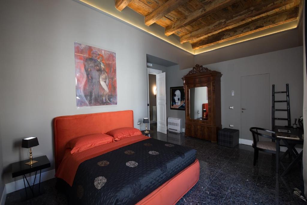 Łóżko lub łóżka w pokoju w obiekcie Palazzo Cannavina Suite & Private SPA