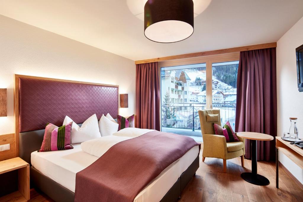 Posteľ alebo postele v izbe v ubytovaní Gletscherblick B&B