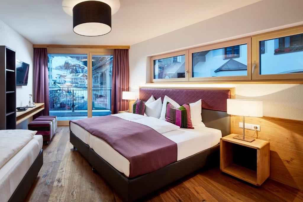Posteľ alebo postele v izbe v ubytovaní Gletscherblick B&B