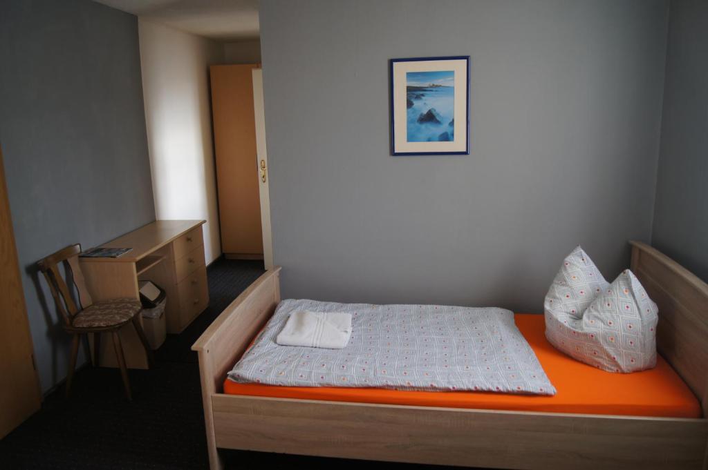 Postel nebo postele na pokoji v ubytování Hotel Draschwitz