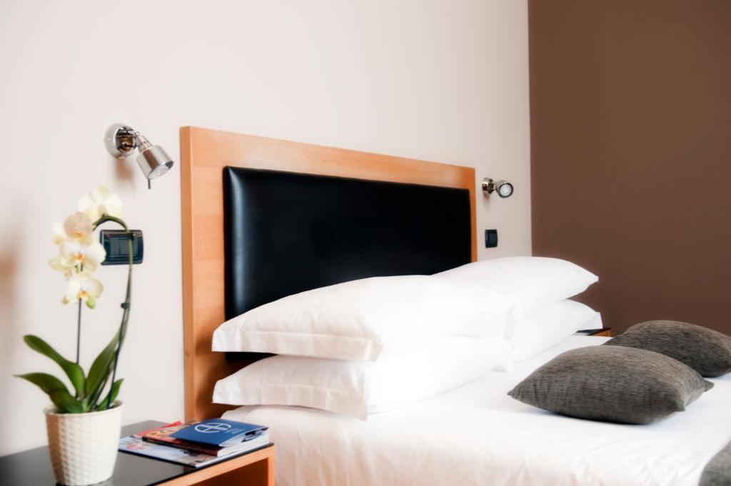 Postel nebo postele na pokoji v ubytování Best Western Ars Hotel