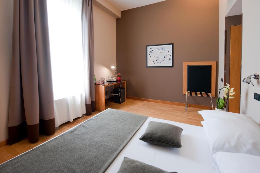 Postel nebo postele na pokoji v ubytování Best Western Ars Hotel