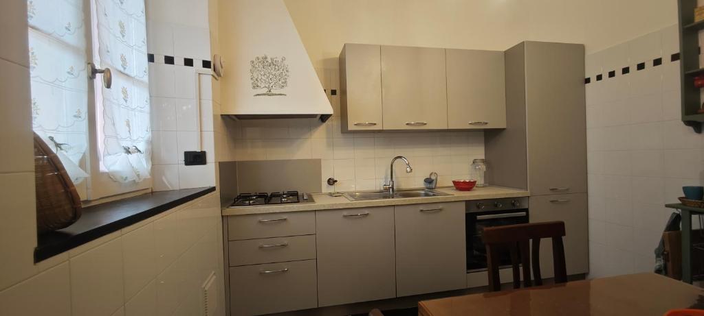 Kuchyň nebo kuchyňský kout v ubytování Casa Margherita