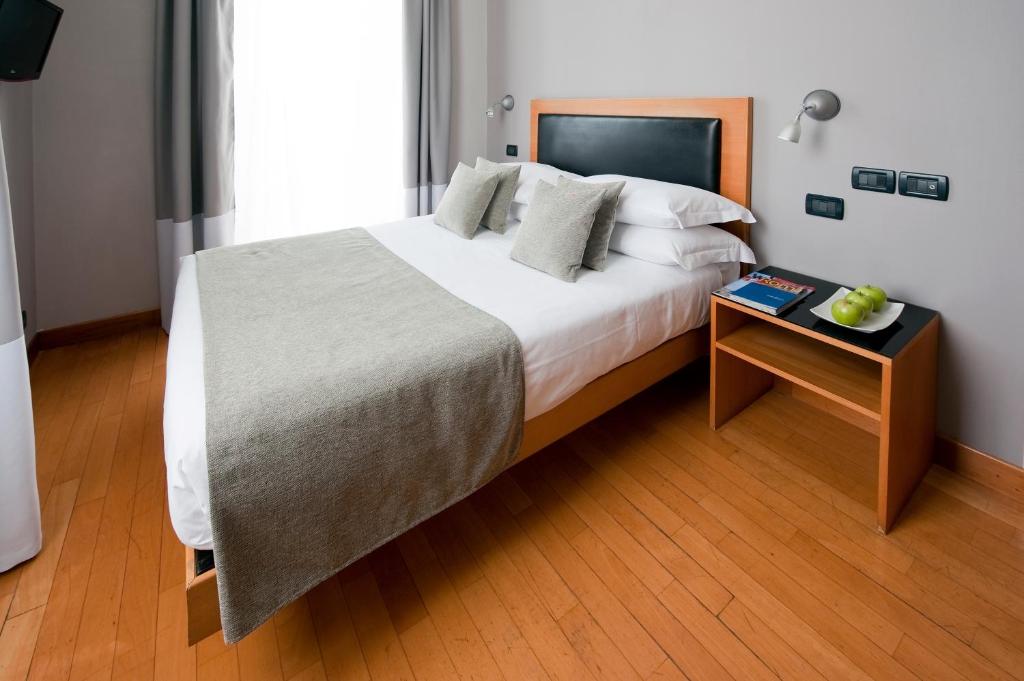 Postel nebo postele na pokoji v ubytování Best Western Ars Hotel