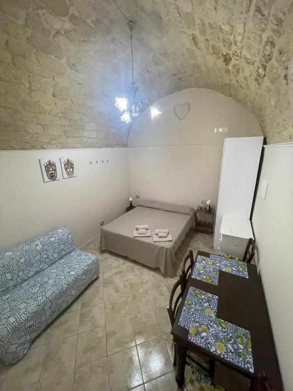 Ένα ή περισσότερα κρεβάτια σε δωμάτιο στο Casa vacanze alloggio a Sud Est