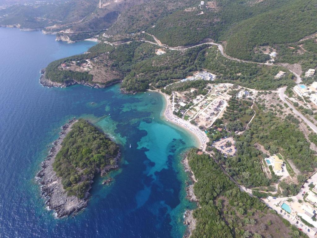 an aerial view of a beach and the ocean at Sivota Apartments in Syvota
