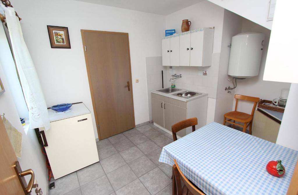 Kuchnia lub aneks kuchenny w obiekcie Apartments Rosanna