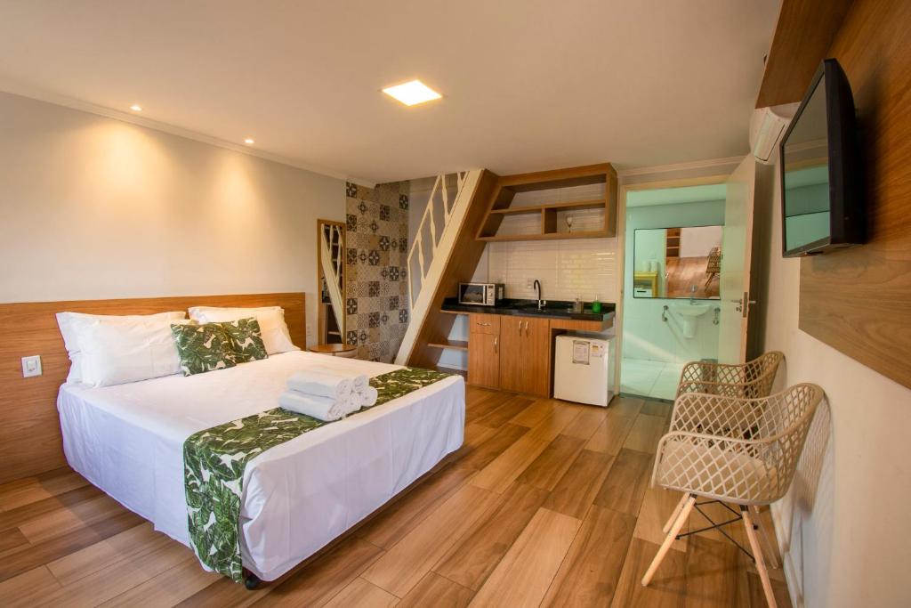 Postel nebo postele na pokoji v ubytování Cabana's Acqua Hotel