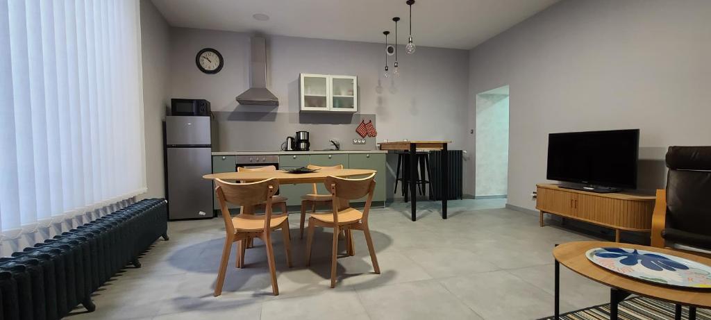 Et tv og/eller underholdning på appartement plein centre ville